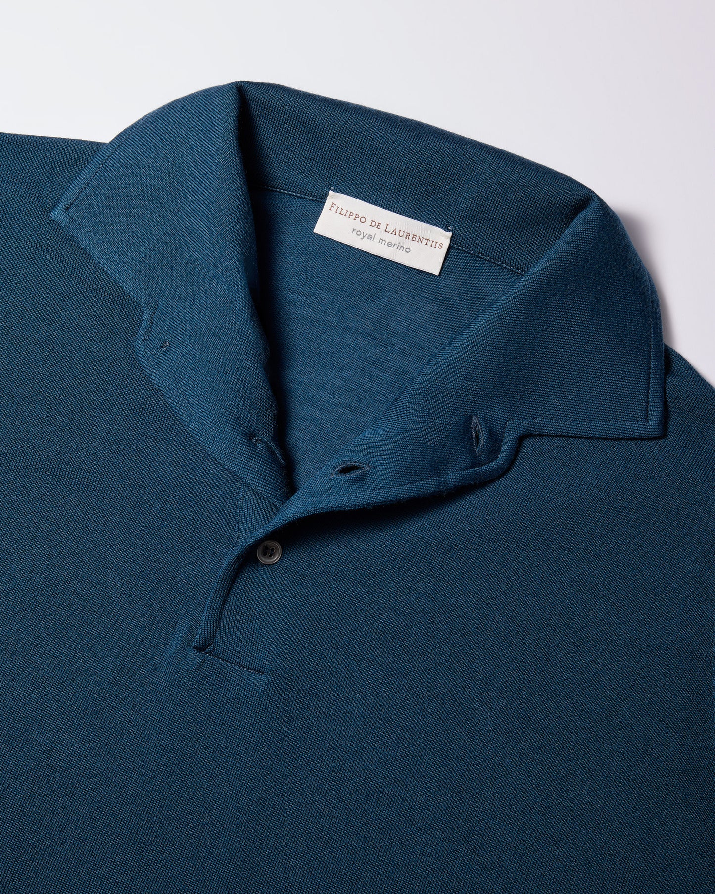 Polo collo con paramontura royal merino turchese scuro
