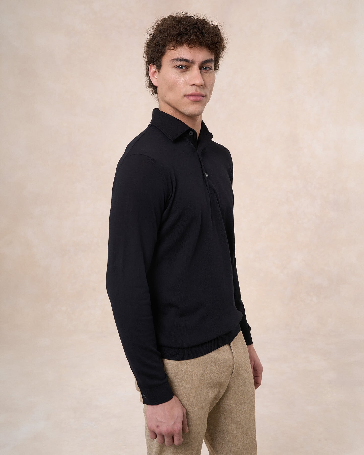 Polo paramontura nera in cotone crepe manica lunga