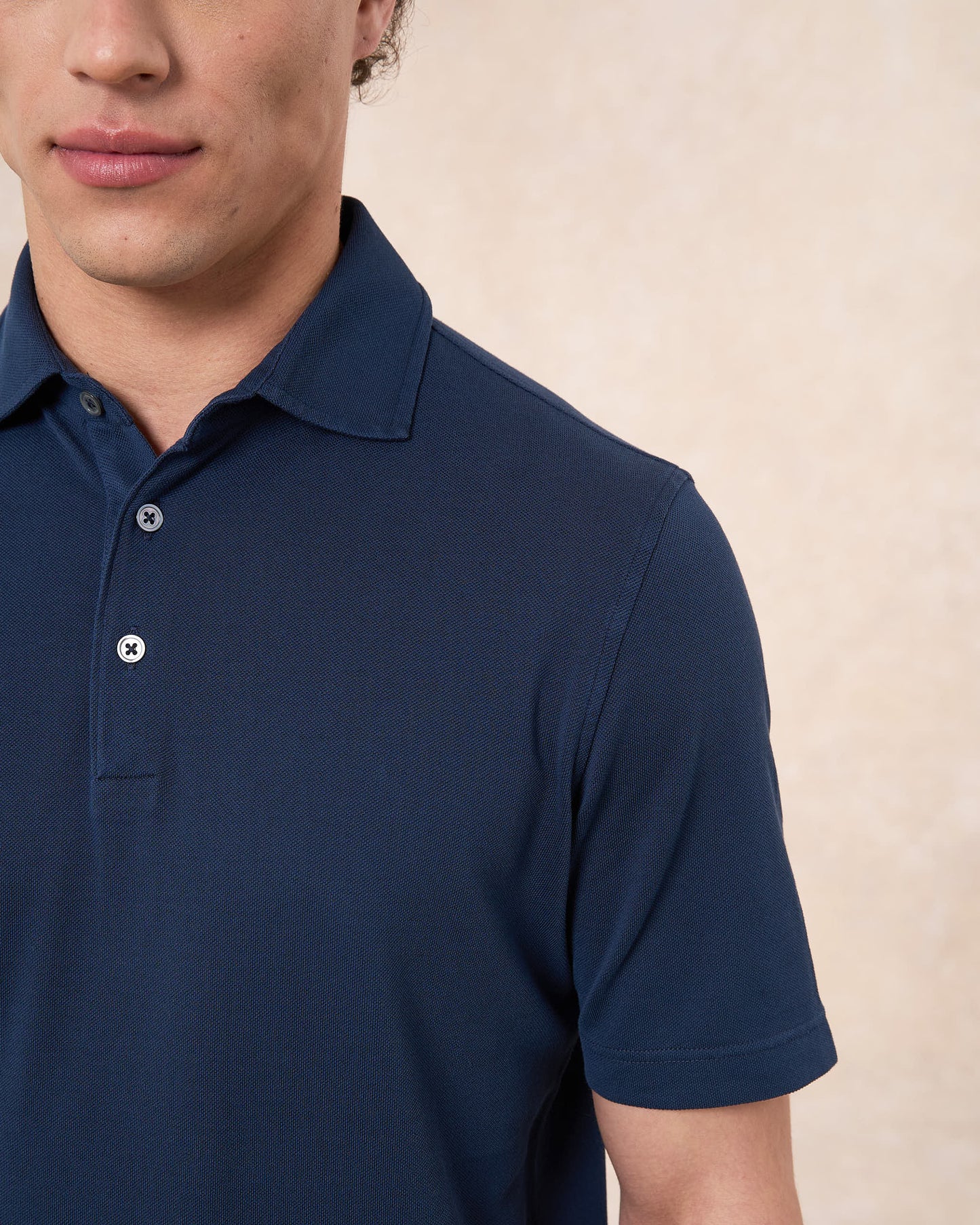 Polo indaco in cotone piqué a manica corta