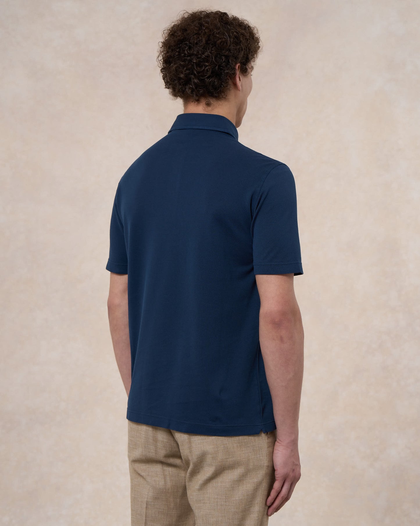 Polo indaco in cotone piqué a manica corta