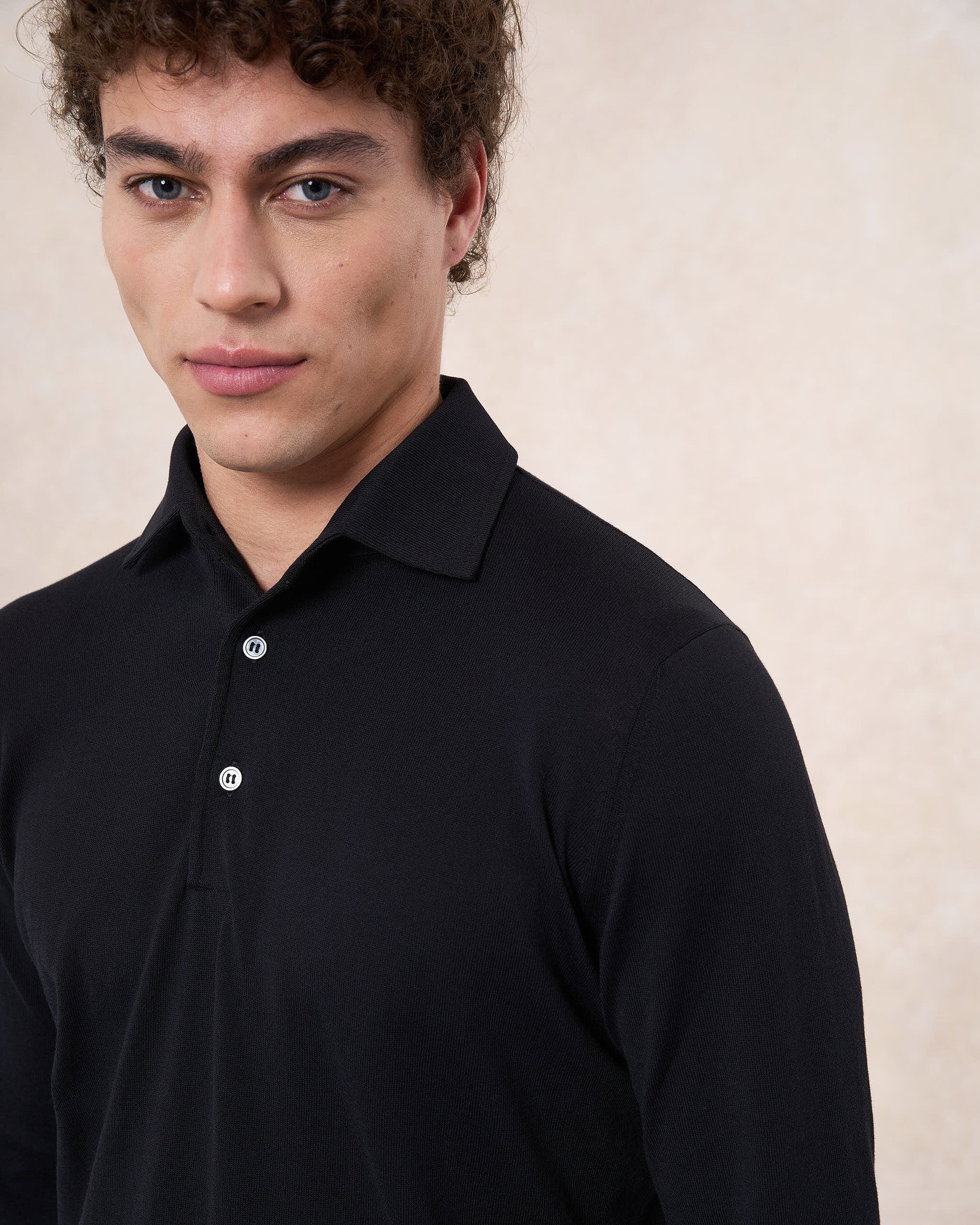 Polo paramontura nera in cotone crepe manica lunga