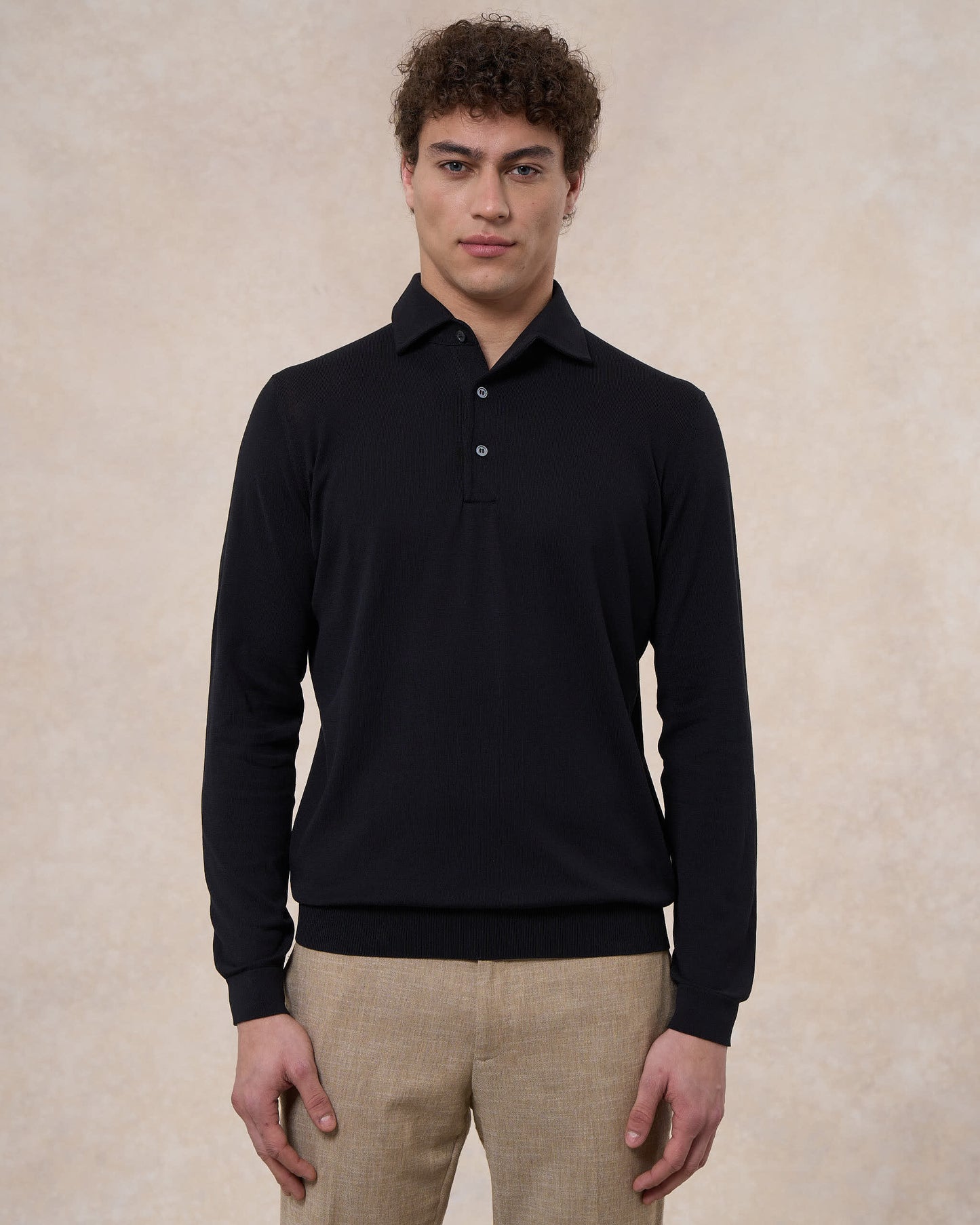 Polo paramontura nera in cotone crepe manica lunga