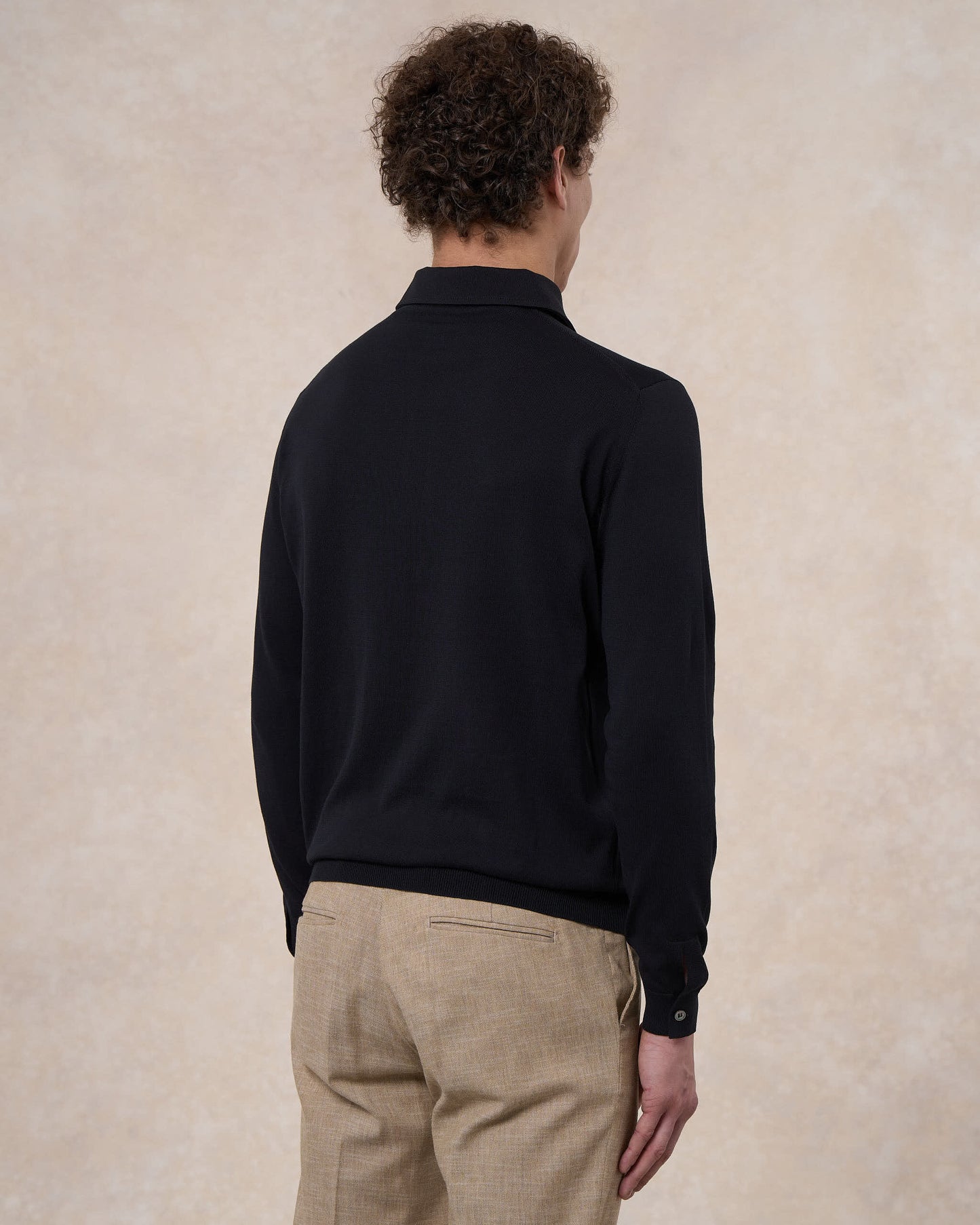 Polo paramontura nera in cotone crepe manica lunga