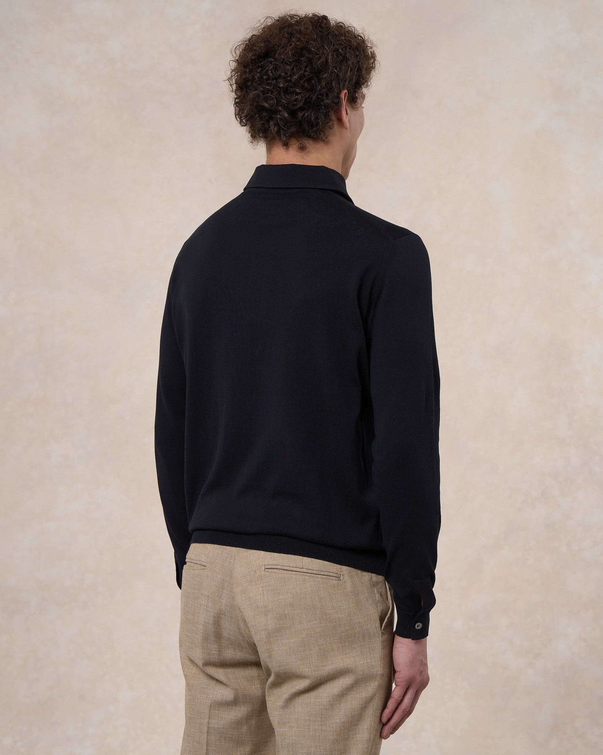 Polo paramontura nera in cotone crepe manica lunga